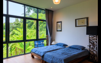 Cozy Third Bedroom with Twin Beds and Scenic View